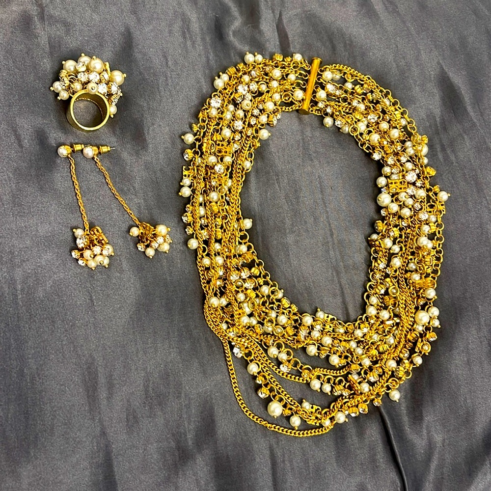 Carolina Herrera necklace, ring, and earring set